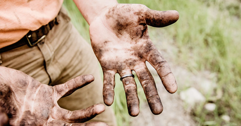 plumber with dirty hands